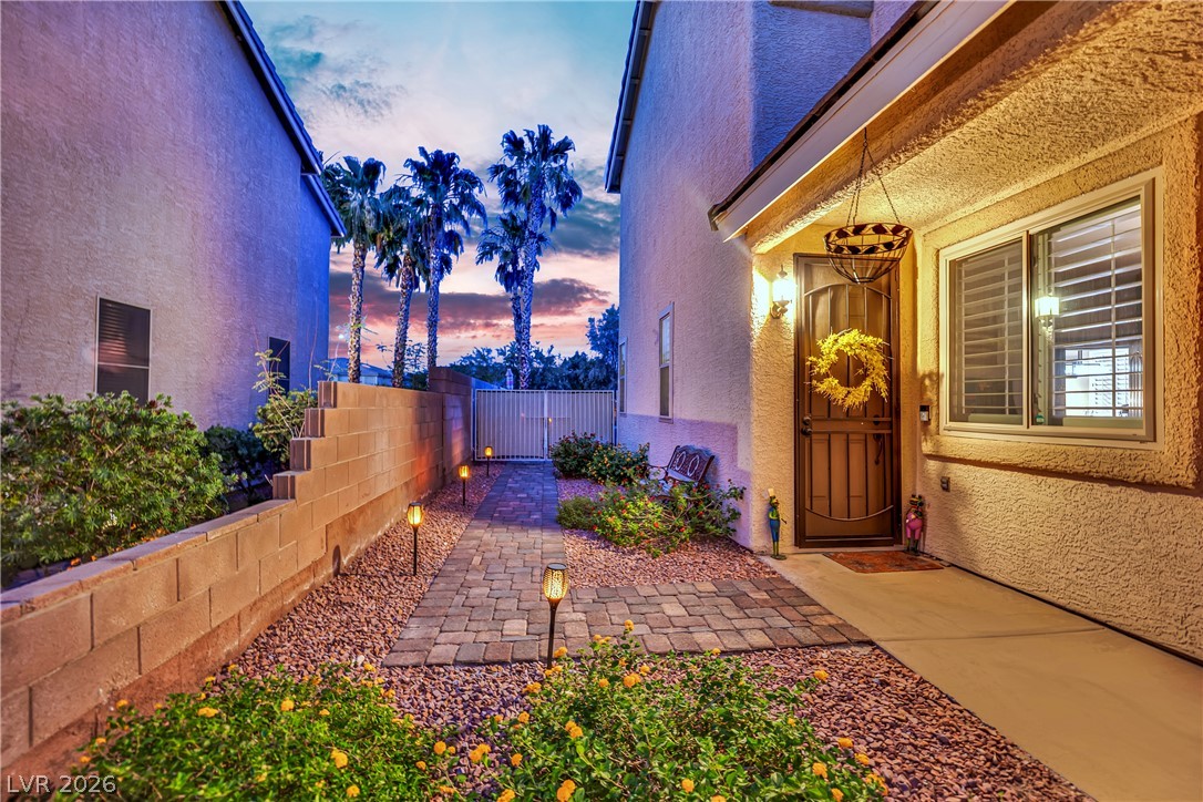 1724 Millstream Way Henderson, NV 89074 - Photo 45 of 60 An inviting entry with paved pathways and charming landscape lighting greets you.