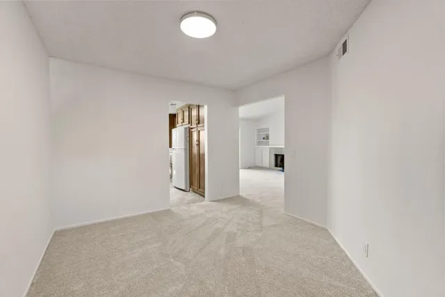 a view of a big room with a fireplace