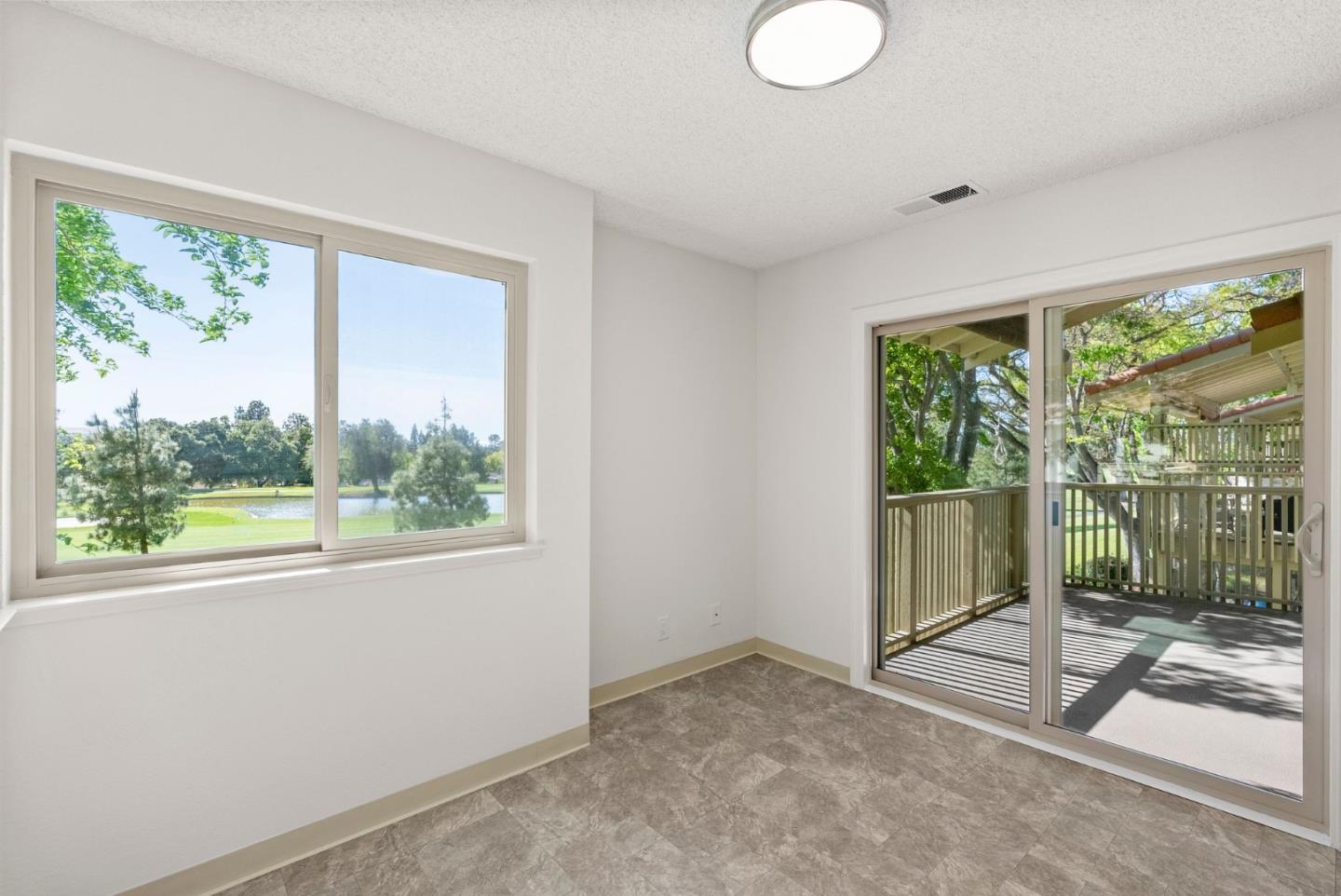 8356 Charbono Court San Jose, CA 95135 - Photo 15 of 48 a view of a room with a large window