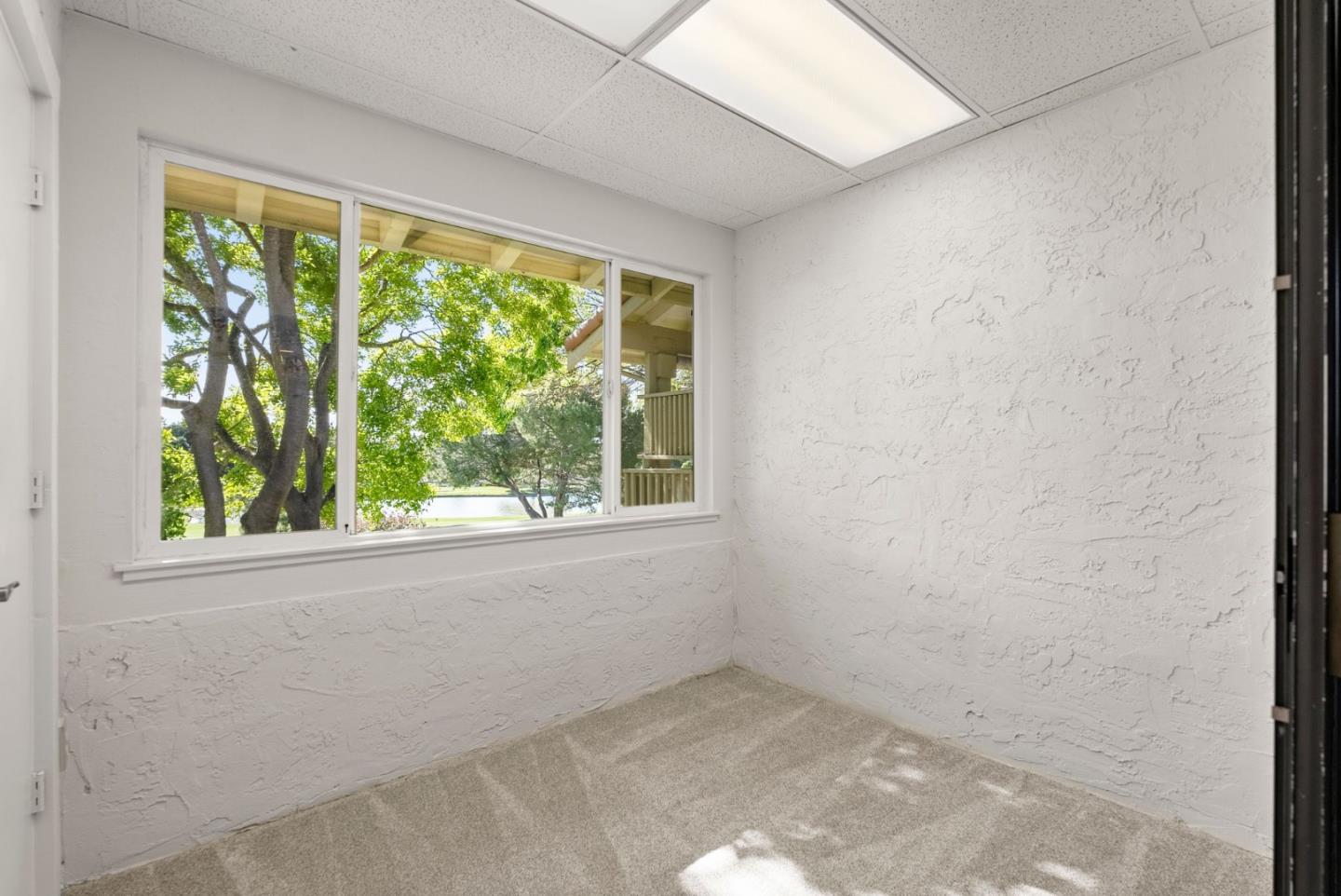 8356 Charbono Court San Jose, CA 95135 - Photo 17 of 48 an empty room with a window