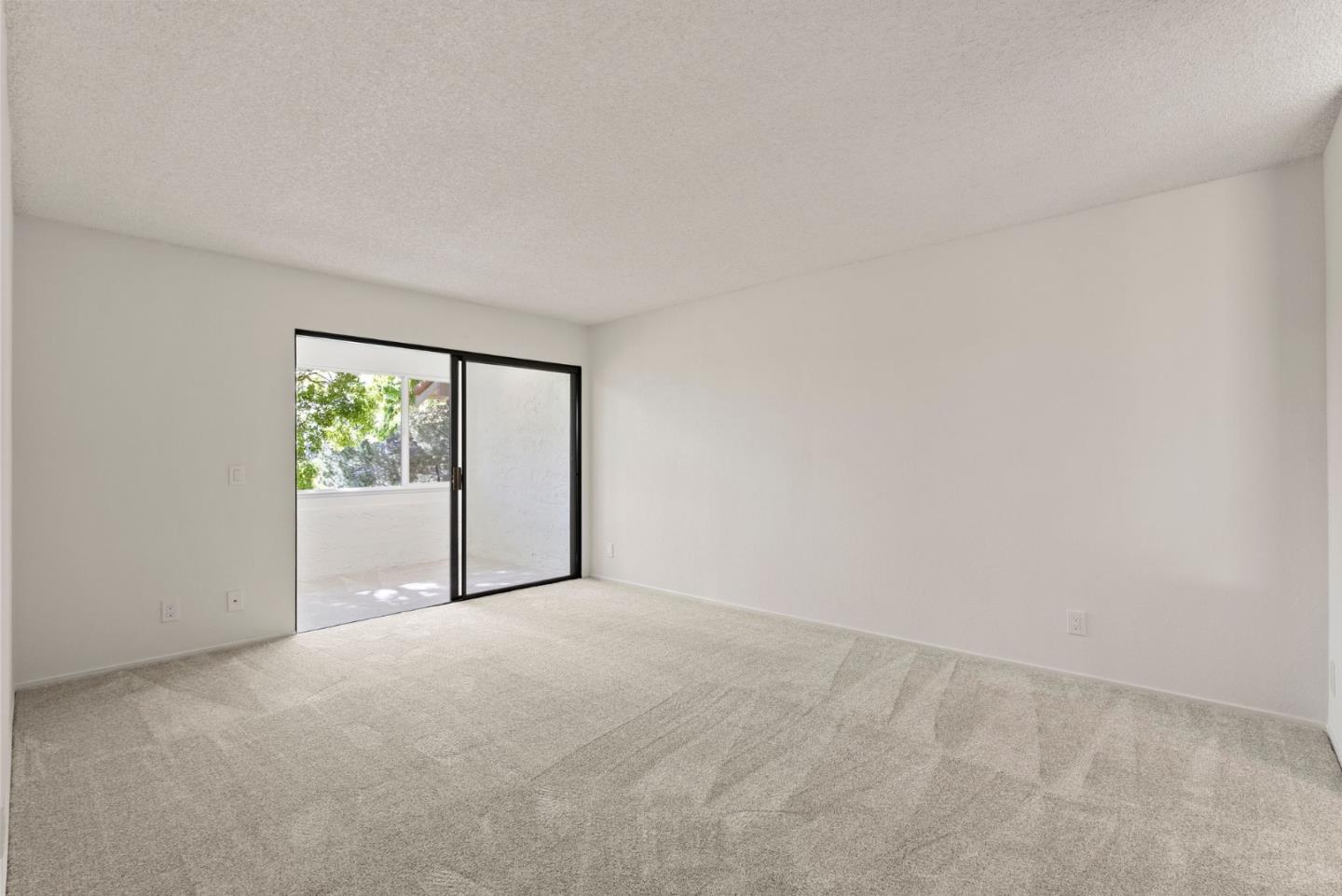 8356 Charbono Court San Jose, CA 95135 - Photo 18 of 48 a view of an empty room with a window