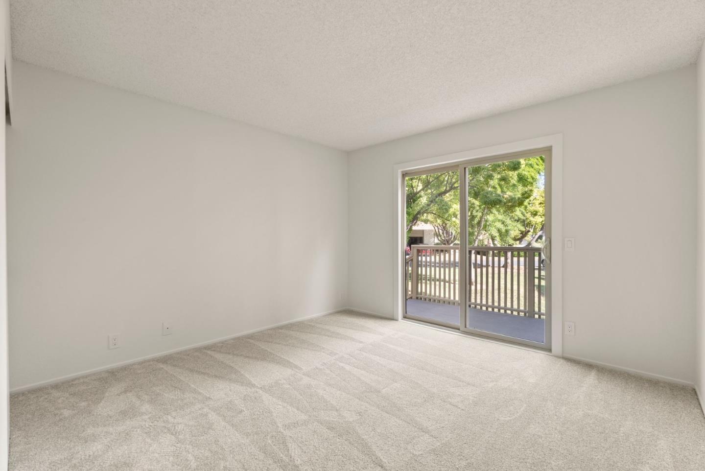 8356 Charbono Court San Jose, CA 95135 - Photo 20 of 48 an empty room with windows