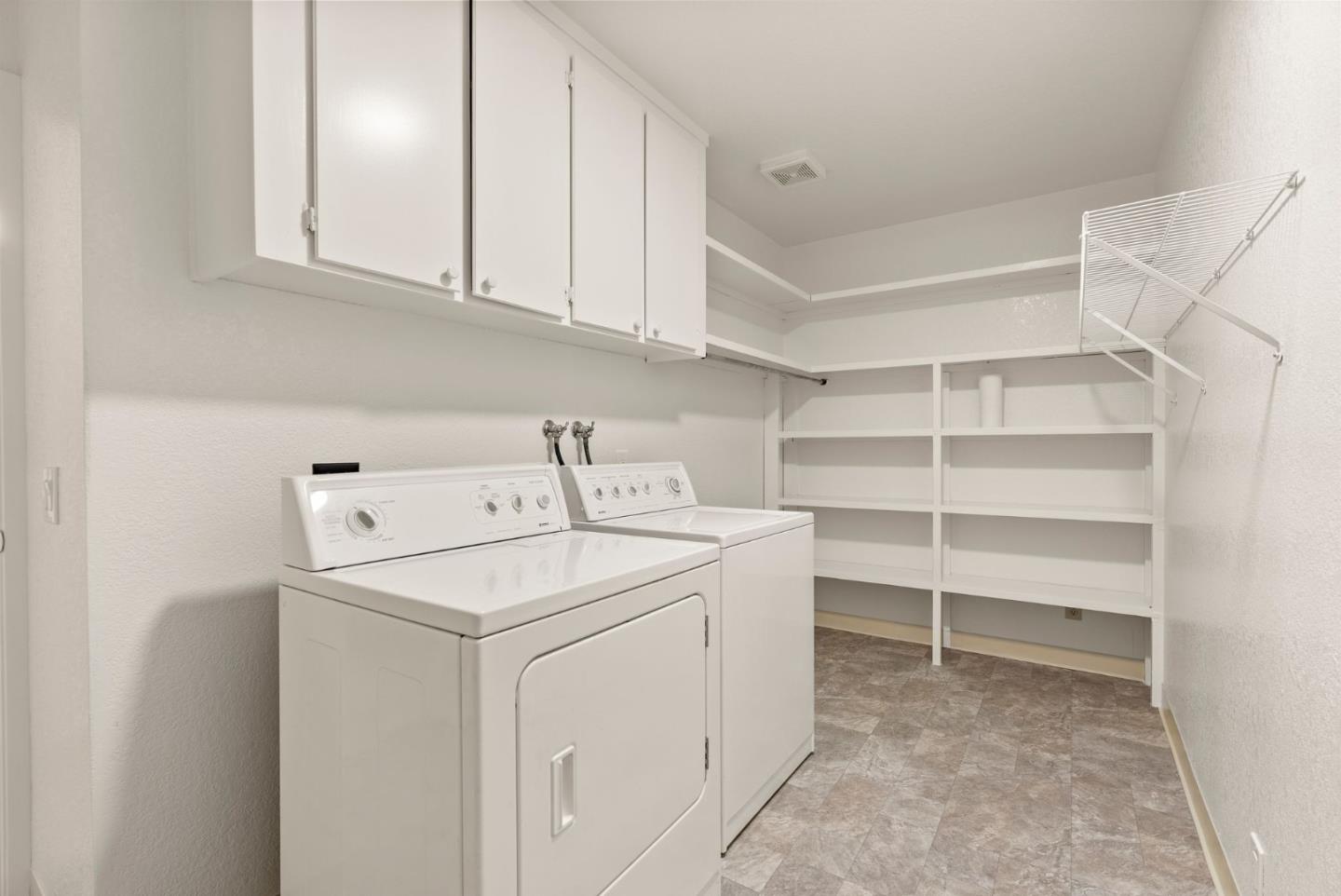 8356 Charbono Court San Jose, CA 95135 - Photo 25 of 48 a utility room with dryer and washer