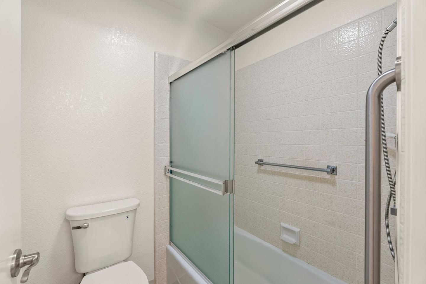 8356 Charbono Court San Jose, CA 95135 - Photo 29 of 48 a bathroom with a toilet and a shower