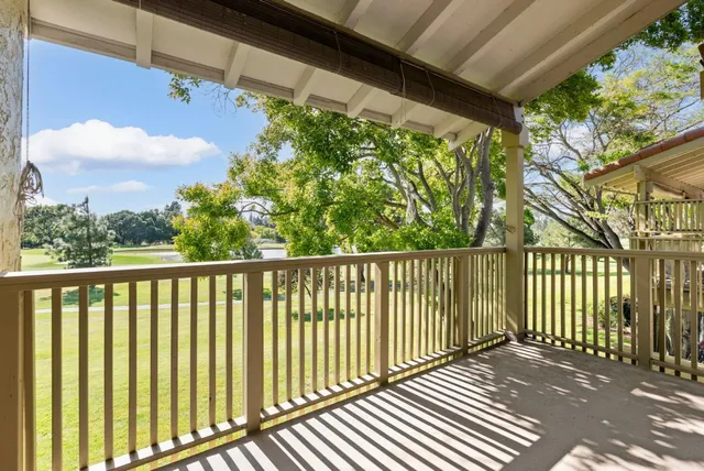 a view of a balcony with an outdoor space