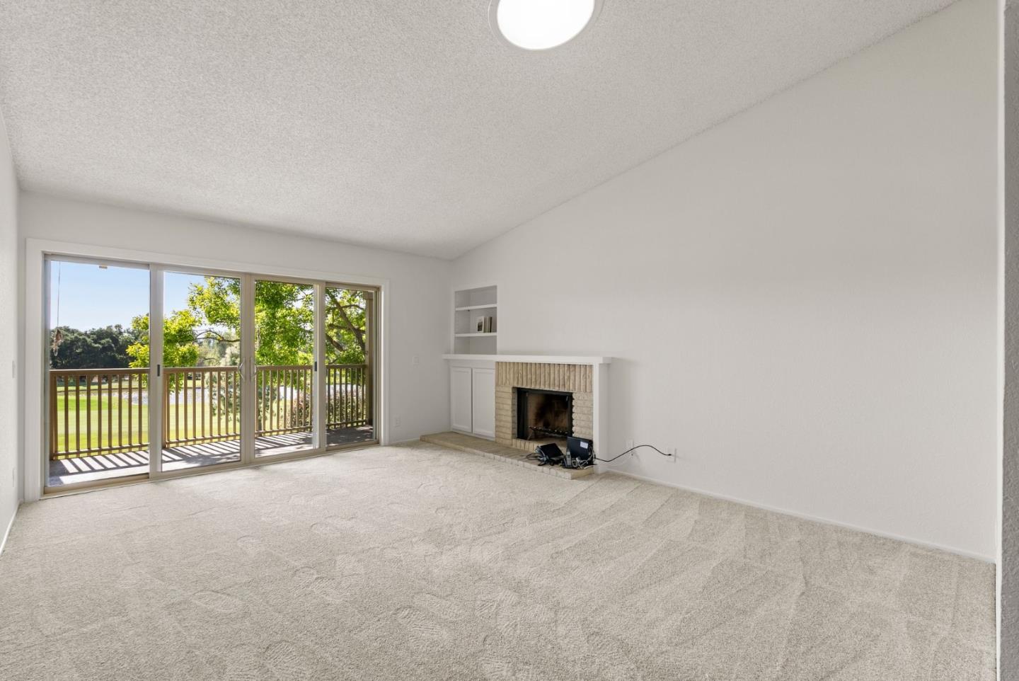 8356 Charbono Court San Jose, CA 95135 - Photo 6 of 48 a view of a room with a large window