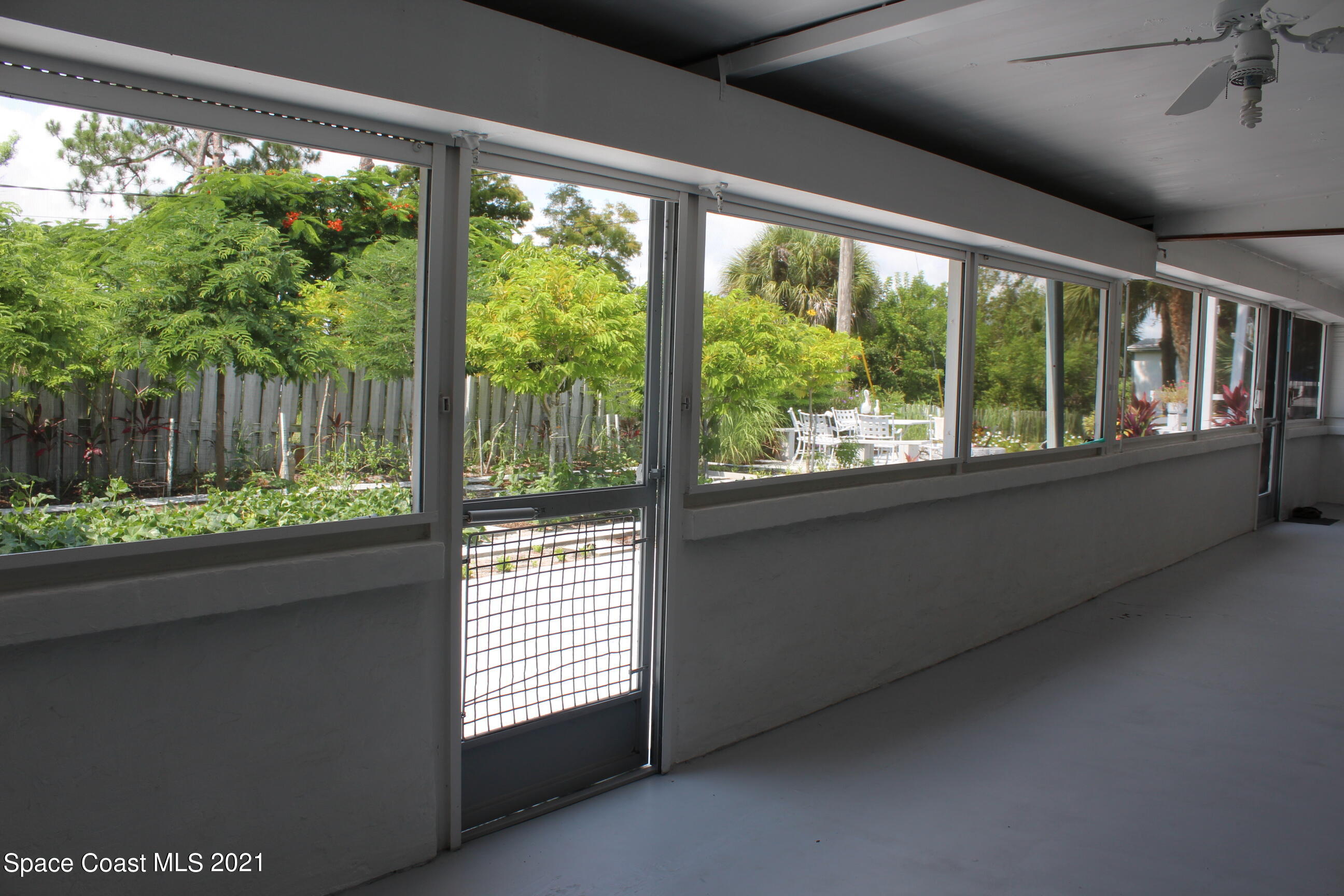 1775 Via Roma Merritt Island, FL 32952 - Photo 26 of 41 Huge Porch