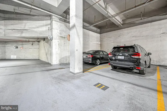 a view of an empty room with a bathroom