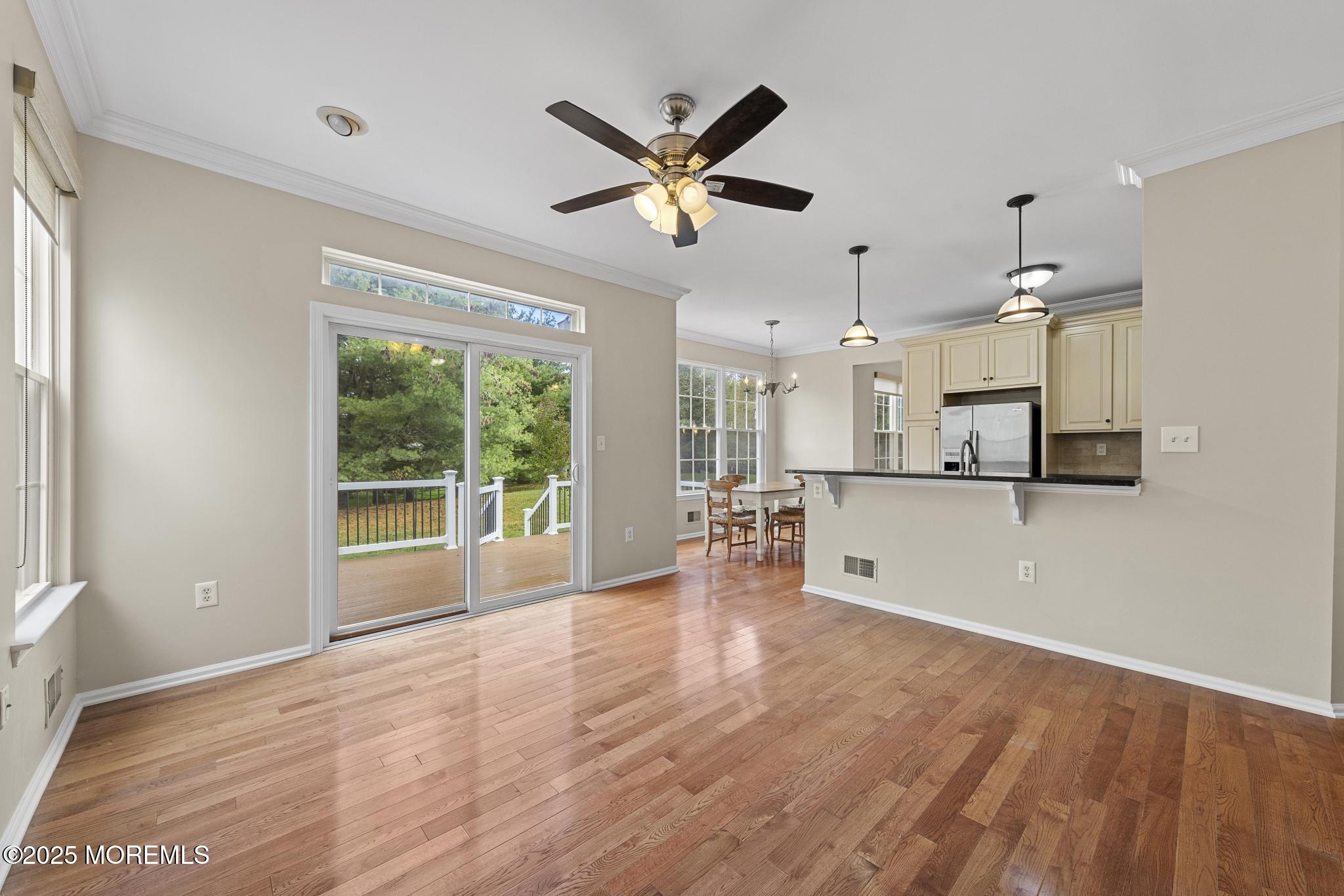 6 Lafayette Colts Neck Colts Neck, NJ 07722 - Photo 14 of 43 a view of empty room with wooden floor and ceiling fan