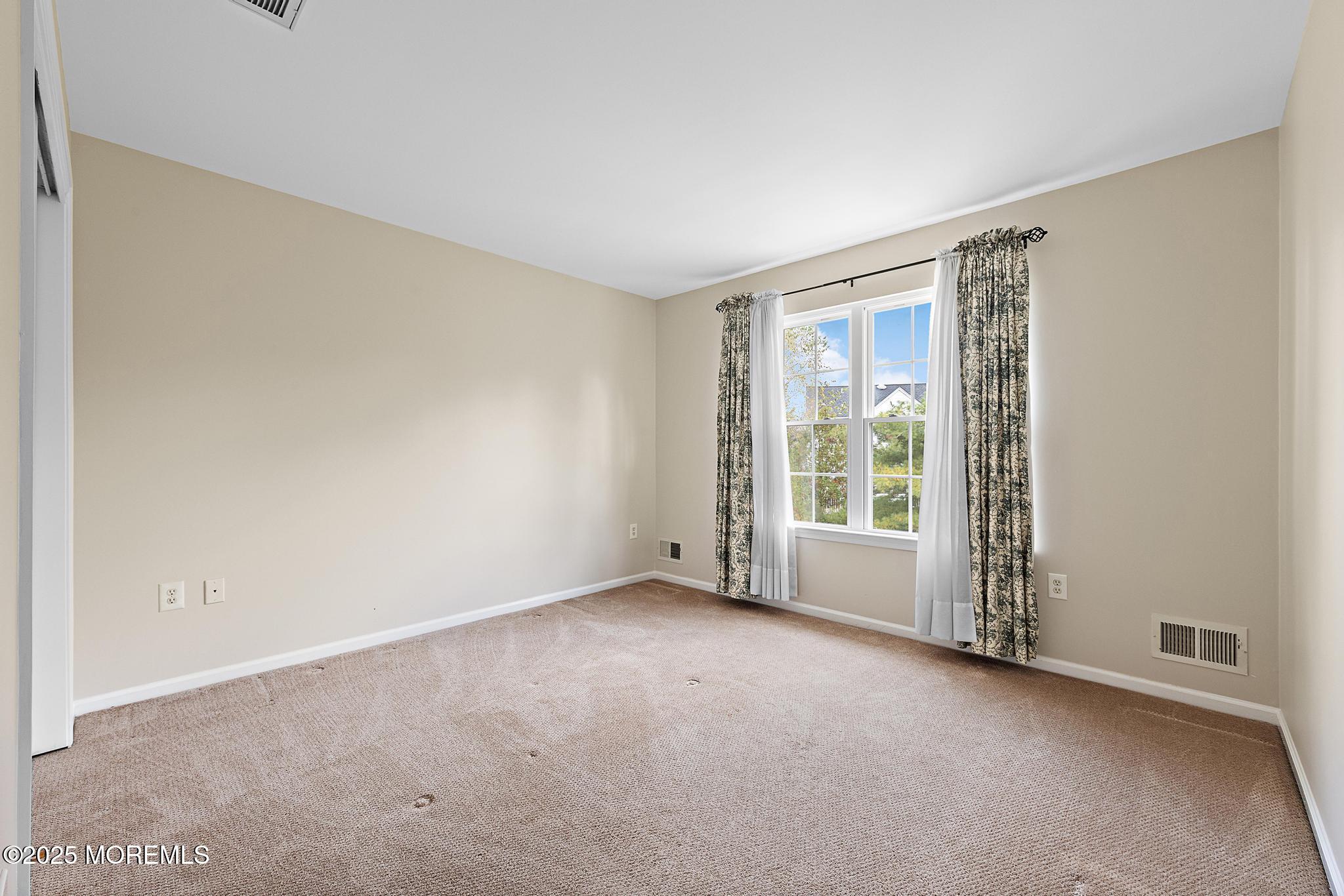 6 Lafayette Colts Neck Colts Neck, NJ 07722 - Photo 17 of 43 a view of an empty room with a window