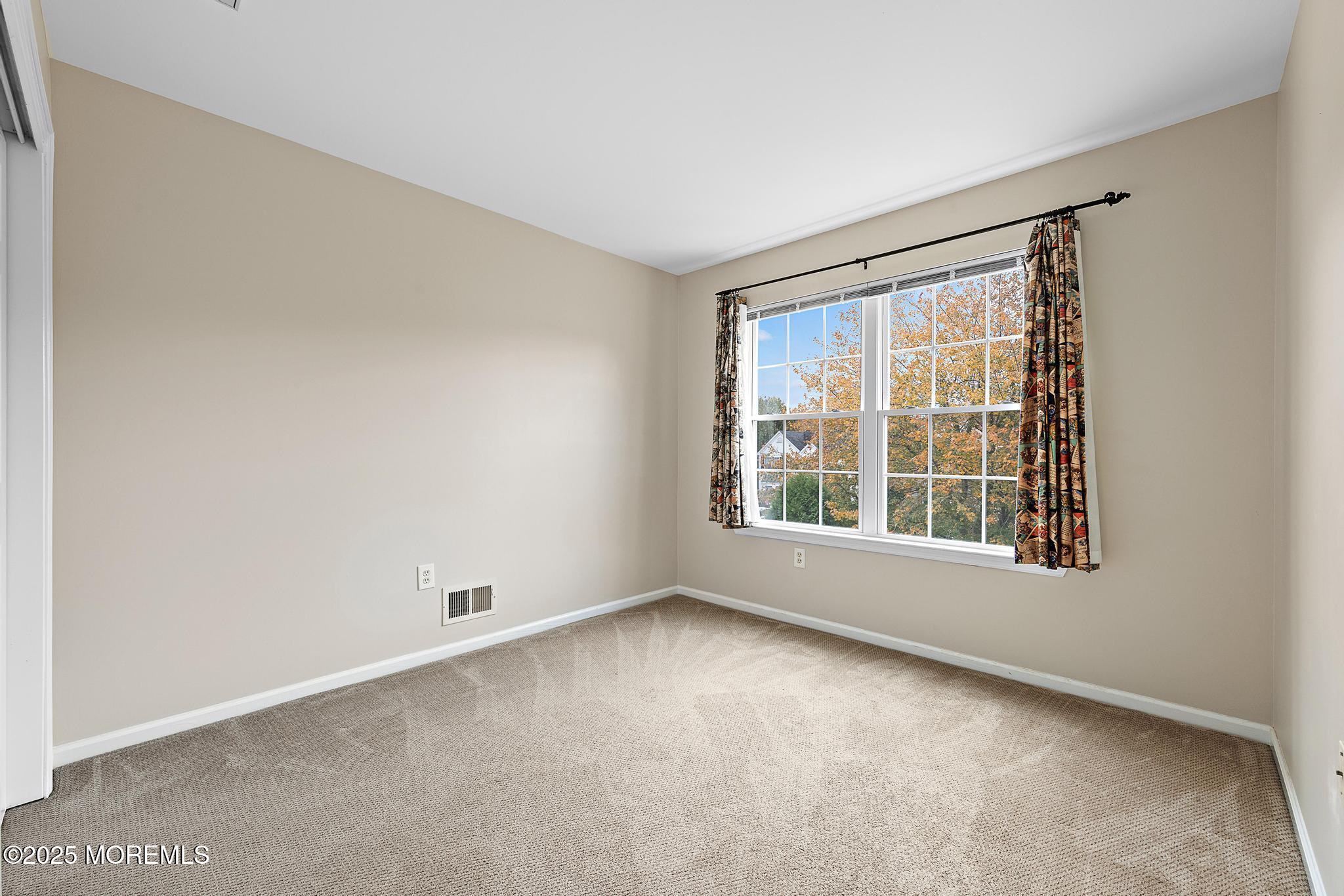 6 Lafayette Colts Neck Colts Neck, NJ 07722 - Photo 18 of 43 an empty room with a window