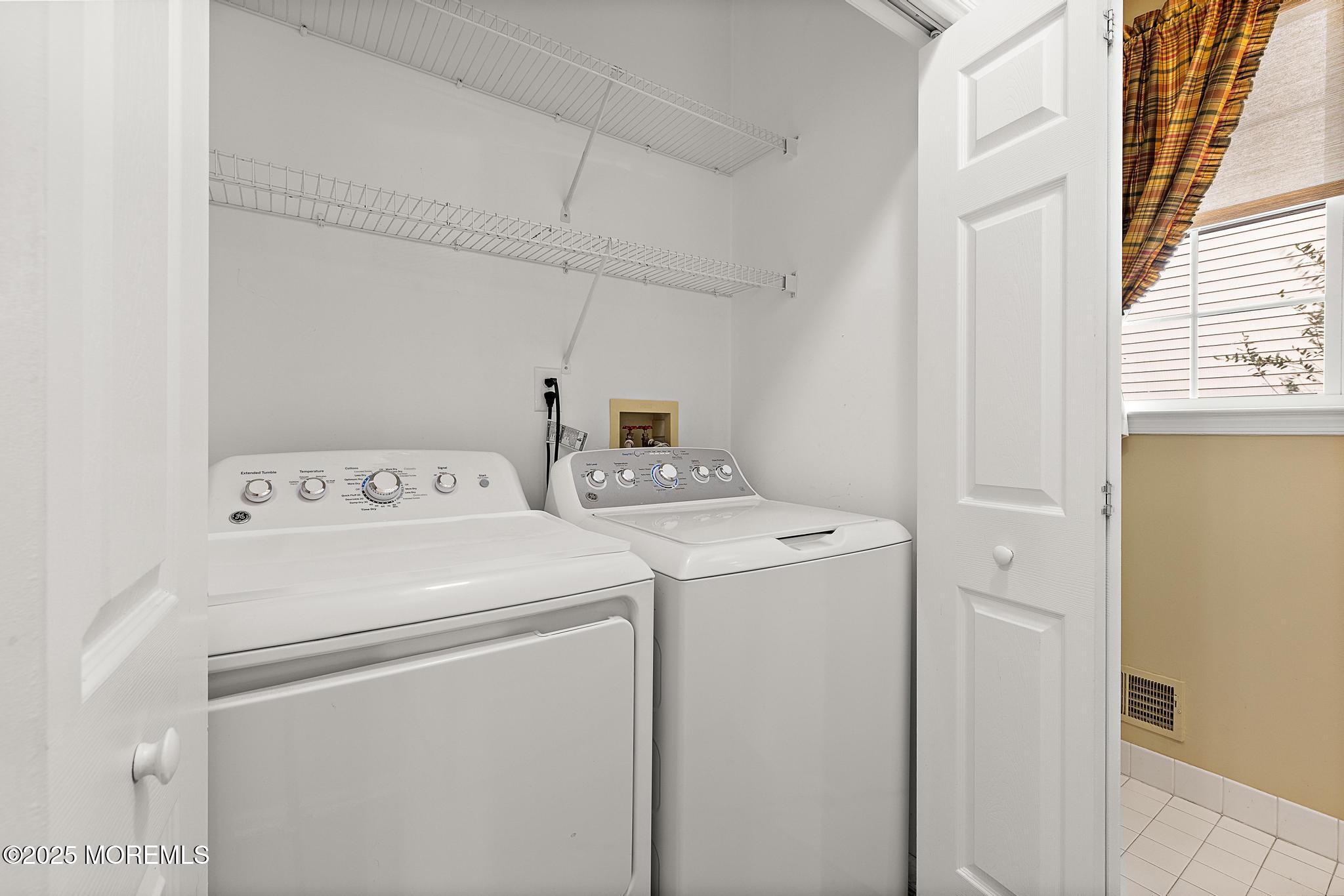 6 Lafayette Colts Neck Colts Neck, NJ 07722 - Photo 24 of 43 a utility room with dryer and washer