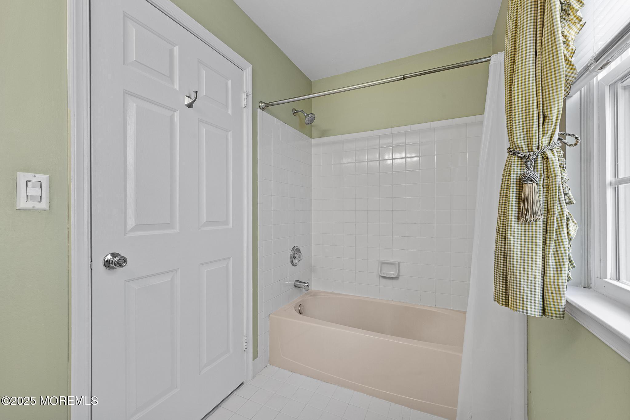 6 Lafayette Colts Neck Colts Neck, NJ 07722 - Photo 27 of 43 a bathroom with a bathtub and a shower