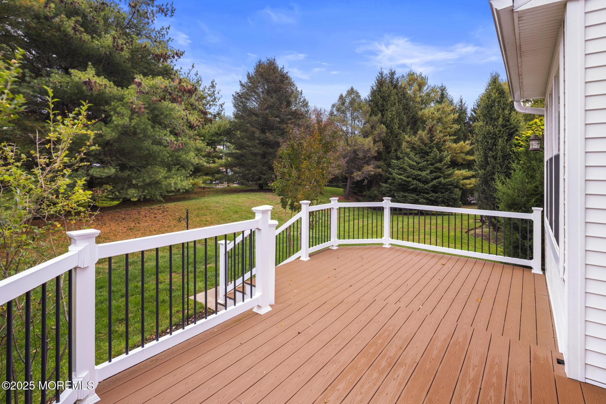 6 Lafayette Colts Neck Colts Neck, NJ 07722 - Photo 29 of 43 a view of balcony with wooden floor and fence