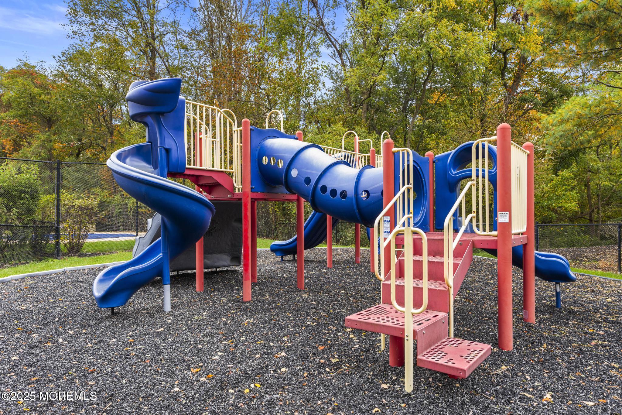 6 Lafayette Colts Neck Colts Neck, NJ 07722 - Photo 36 of 43 a backyard of a house with table and chairs