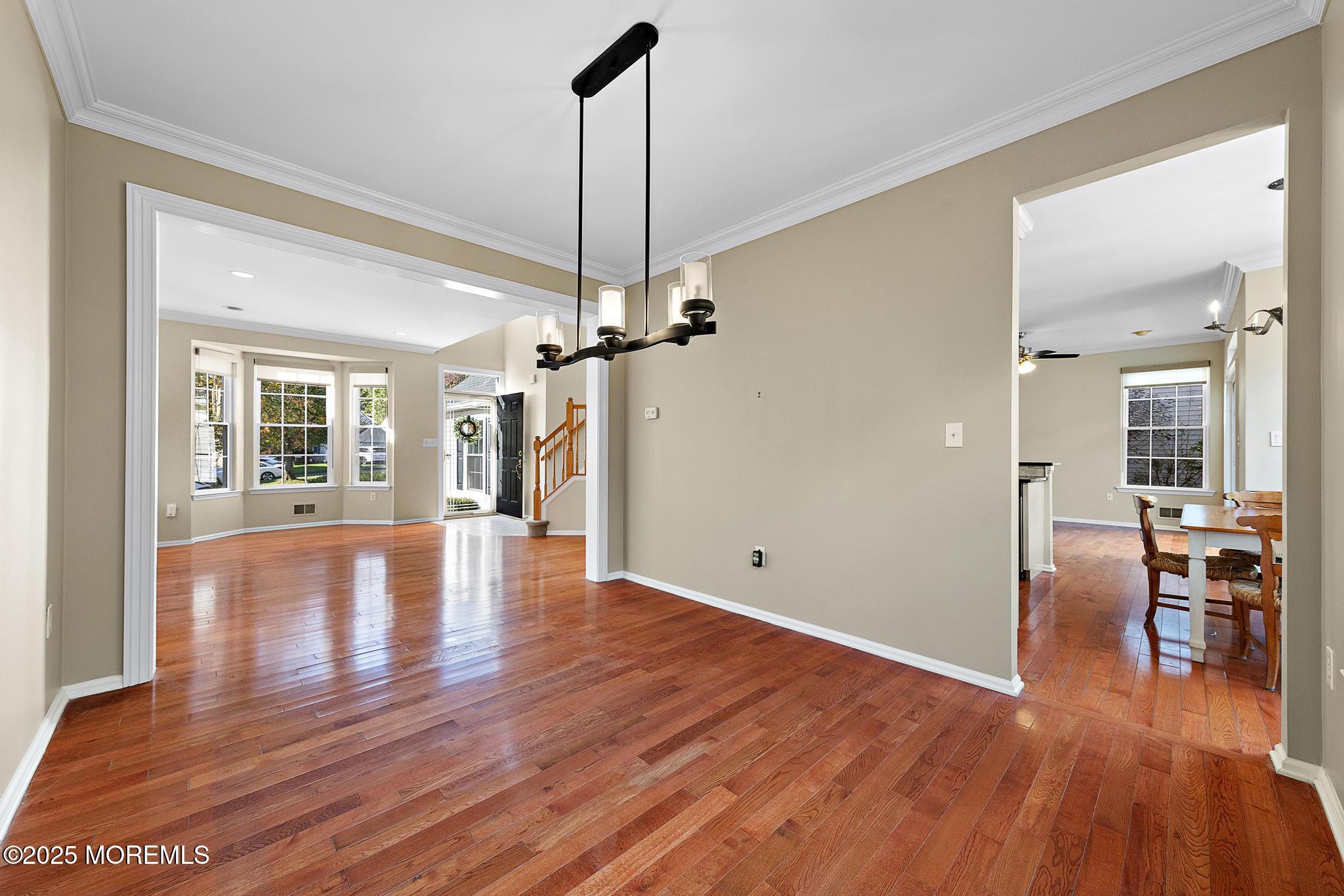 6 Lafayette Colts Neck Colts Neck, NJ 07722 - Photo 7 of 43 a view of empty room with wooden floor and window