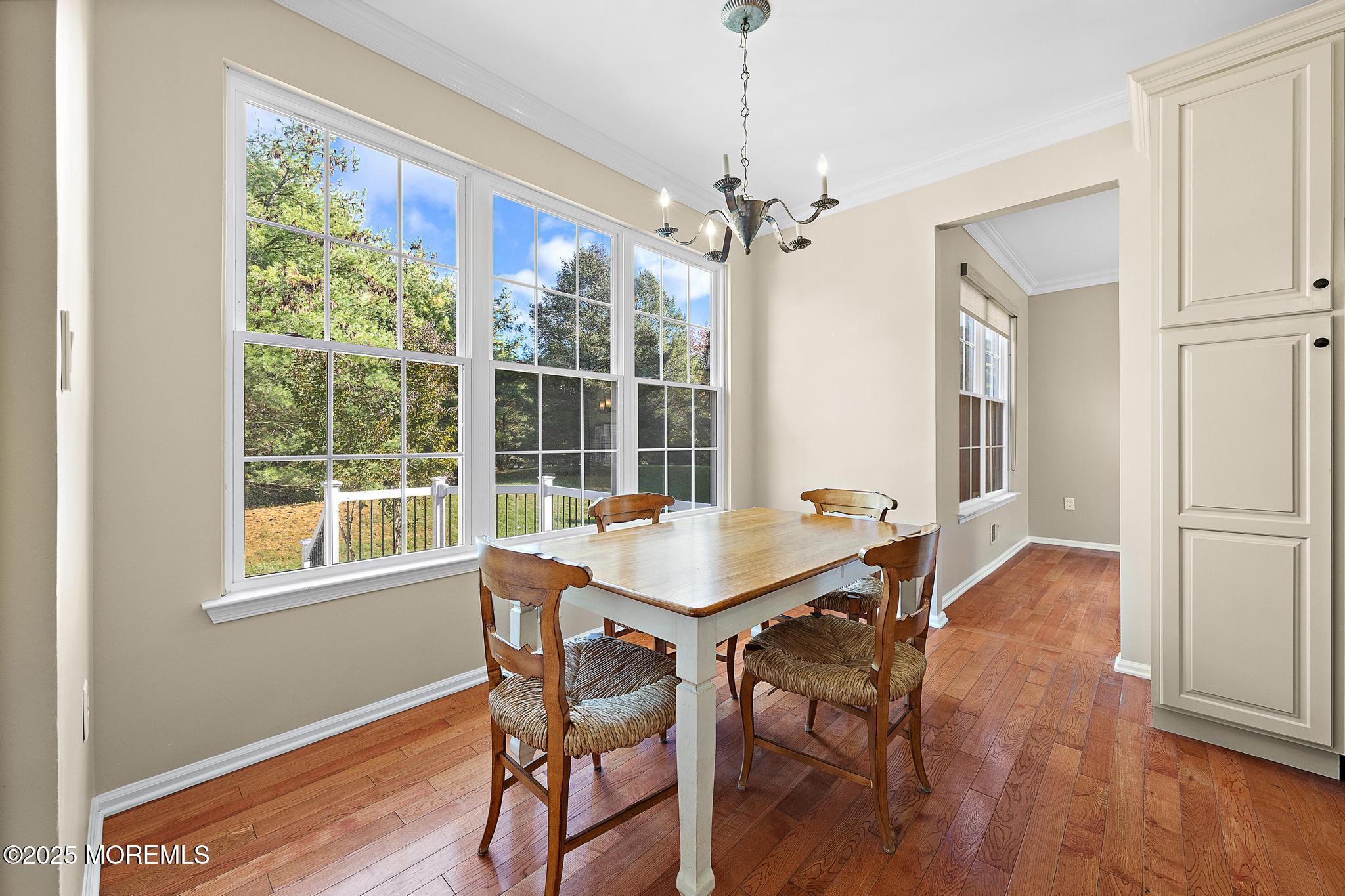 6 Lafayette Colts Neck Colts Neck, NJ 07722 - Photo 8 of 43 a view of a dining room with furniture window and wooden floor
