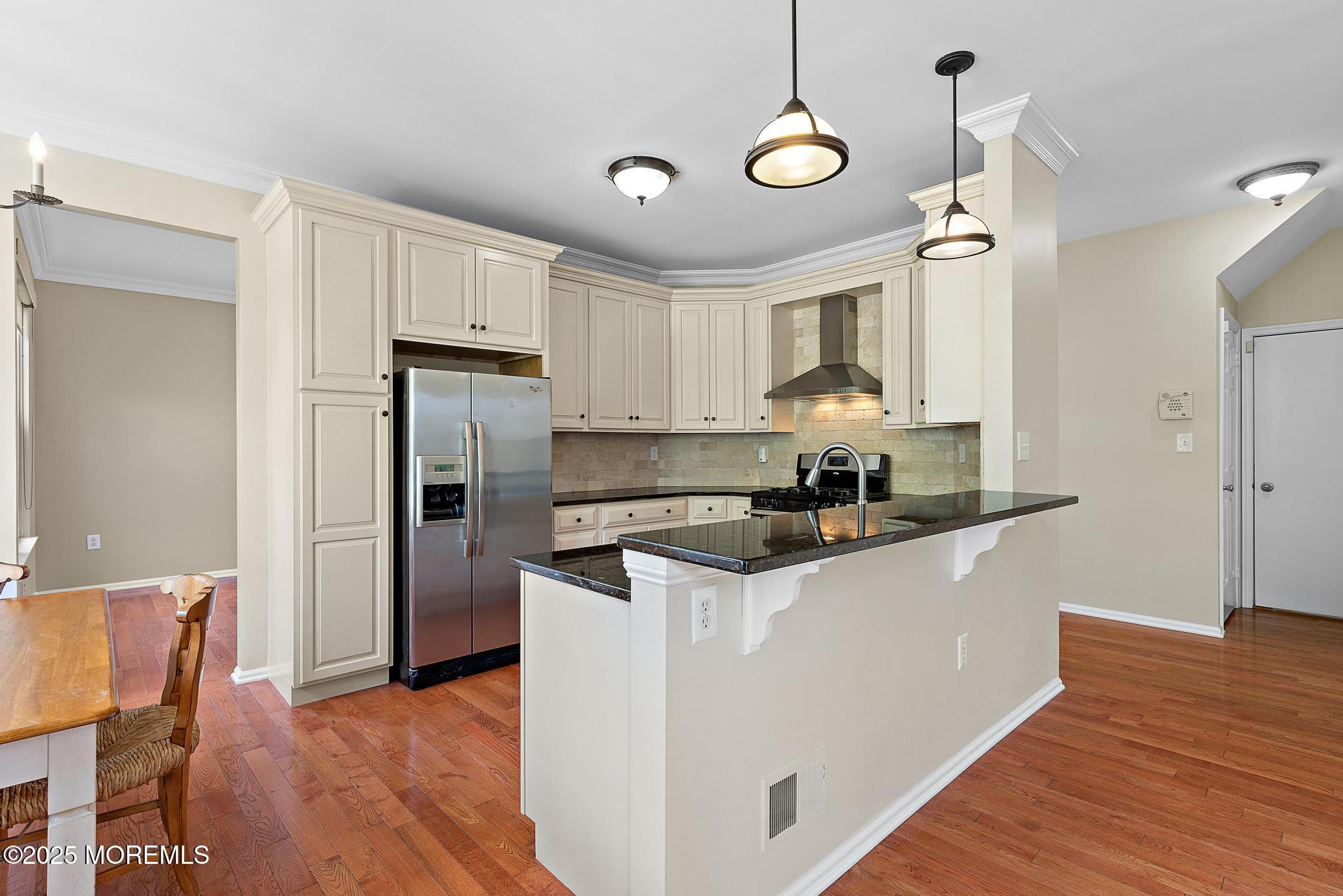 6 Lafayette Colts Neck Colts Neck, NJ 07722 - Photo 10 of 43 a kitchen with stainless steel appliances granite countertop a refrigerator a stove a sink and a microwave