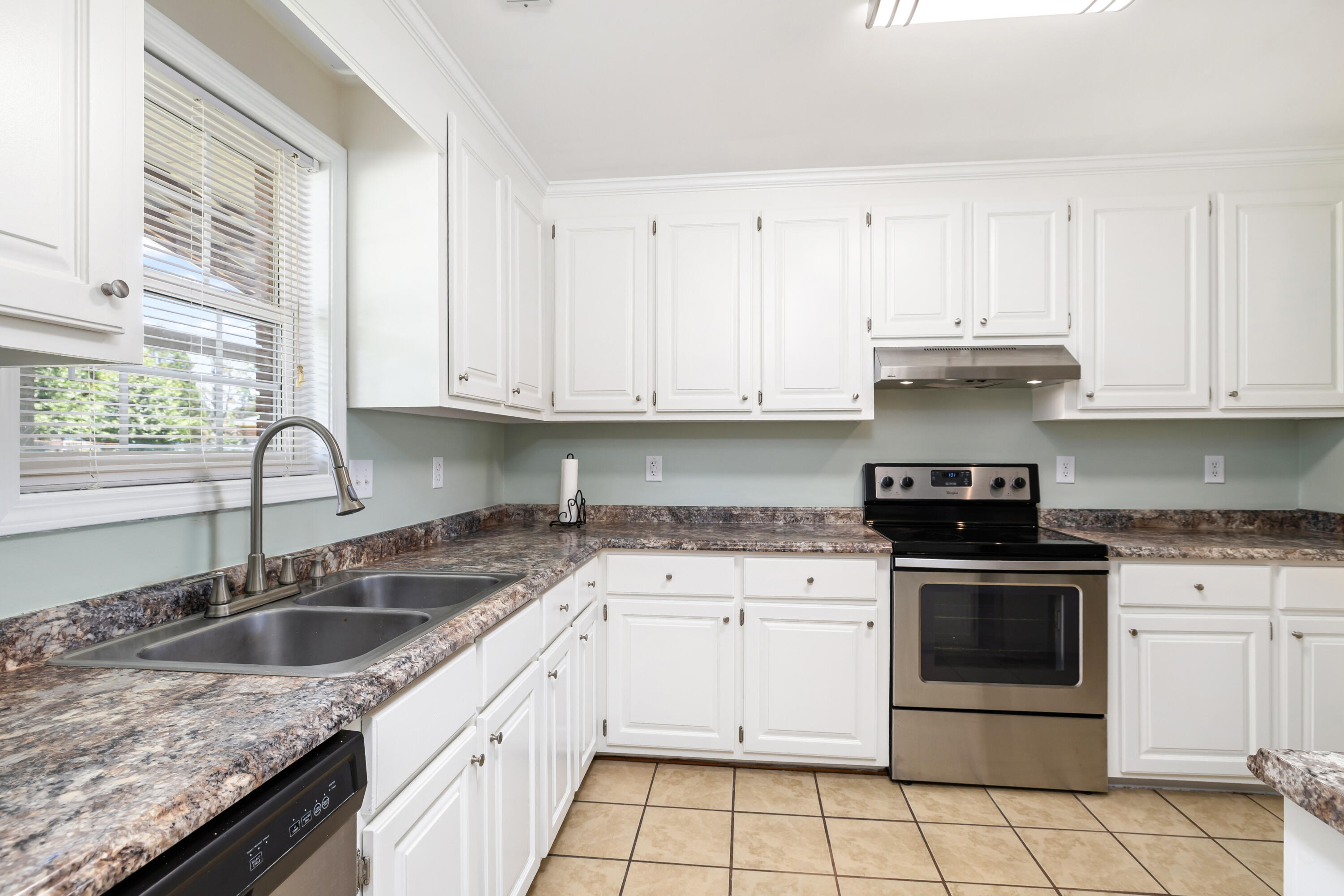 4915 Ridge Street Dalzell, SC 29040 - Photo 15 of 26 Kitchen with a backyard view from the kitchen sink