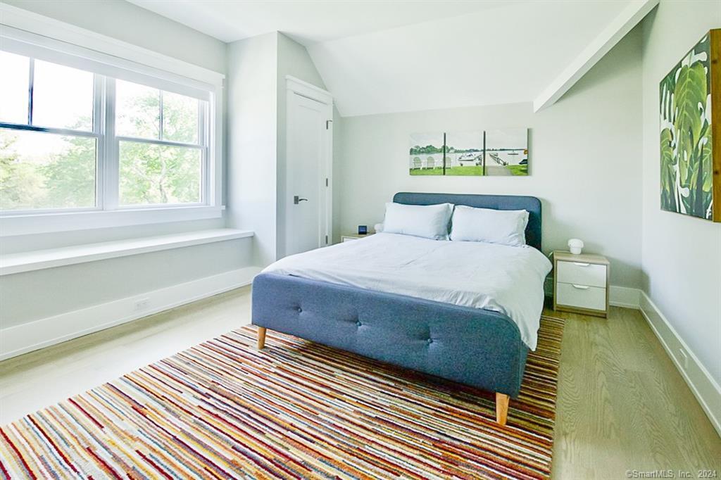 17 Stony Brook Road Westport, CT 06880 - Photo 23 of 39 a bedroom with a bed and a window