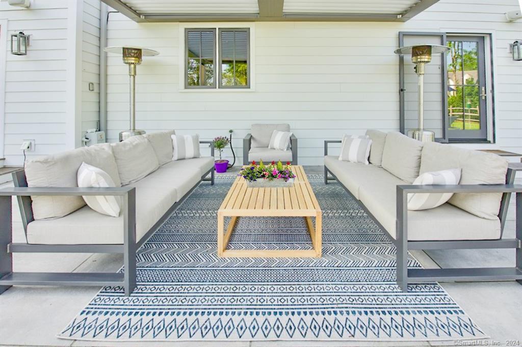 17 Stony Brook Road Westport, CT 06880 - Photo 27 of 39 a living room with furniture and a rug