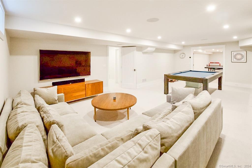 17 Stony Brook Road Westport, CT 06880 - Photo 34 of 39 a living room with furniture and a flat screen tv