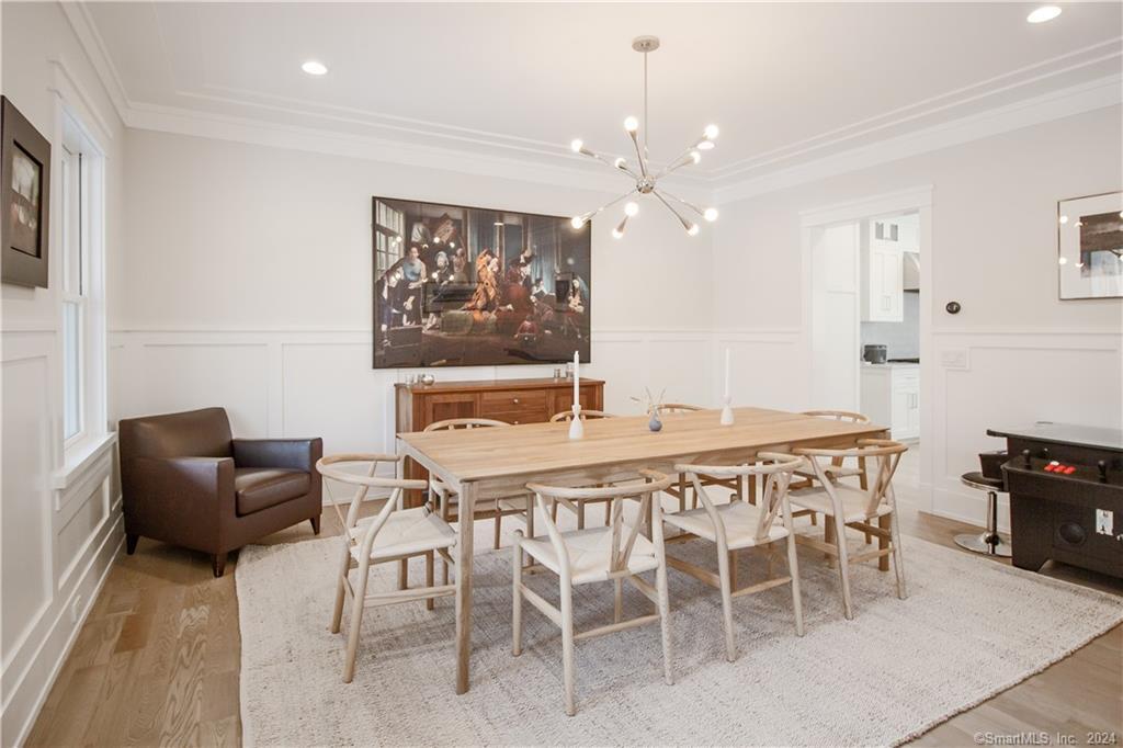 17 Stony Brook Road Westport, CT 06880 - Photo 6 of 39 a view of a dining room with furniture and chandelier