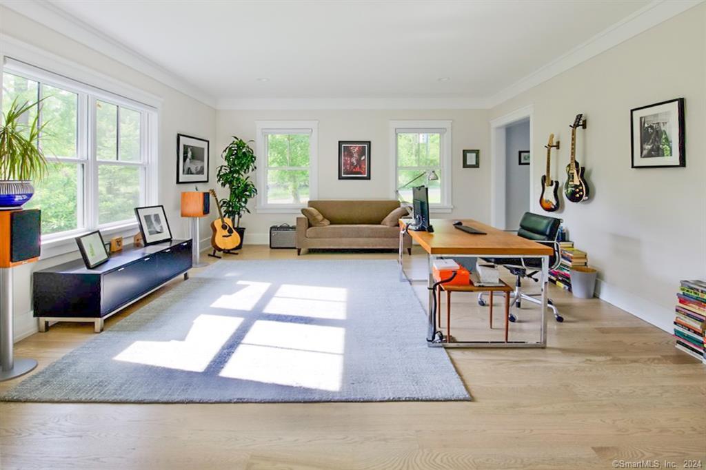 17 Stony Brook Road Westport, CT 06880 - Photo 9 of 39 a living room with furniture and a large window