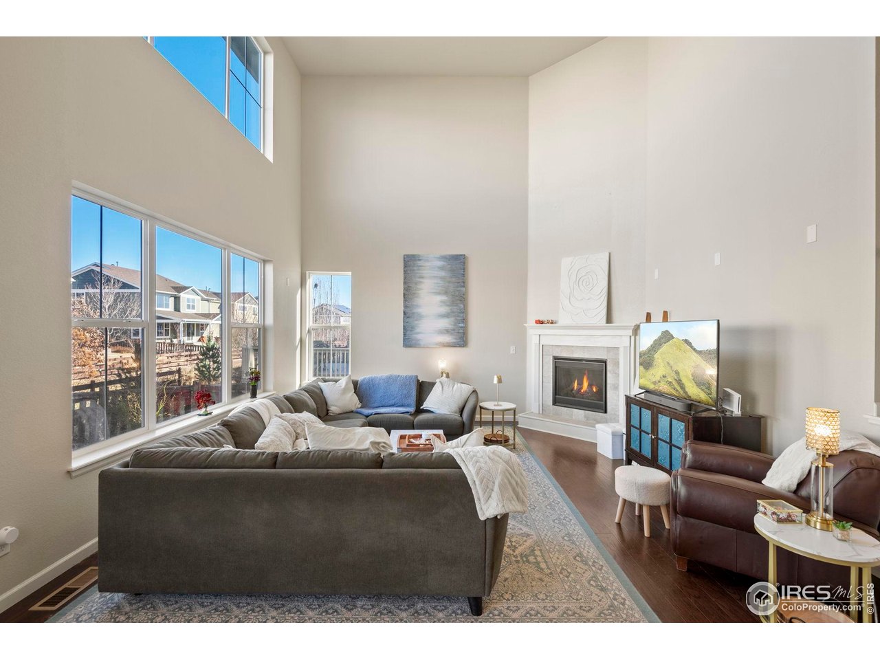 6770 Spring Rain Road Timnath, CO 80547 - Photo 13 of 50 Great room with expansive windows