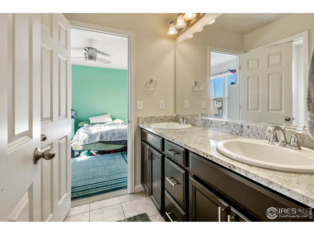 6770 Spring Rain Road Timnath, CO 80547 - Photo 25 of 50 Jack and Jill bath connecting bedroom 3 and 4