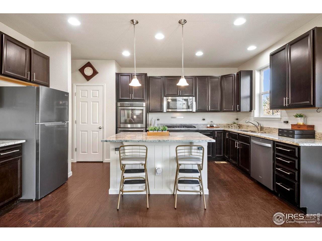 6770 Spring Rain Road Timnath, CO 80547 - Photo 4 of 50 Spacious kitchen