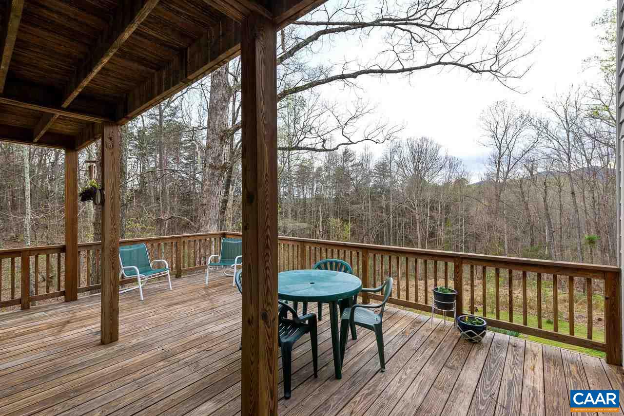 5990 Buck Ridge Road Earlysville, VA 22936 - Photo 11 of 18 a terrace view with sitting space and trees