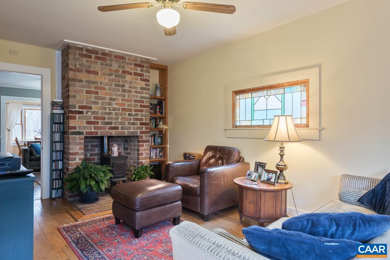 5990 Buck Ridge Road Earlysville, VA 22936 - Photo 7 of 18 a living room with furniture and a potted plant