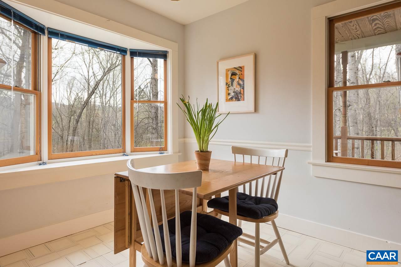 5990 Buck Ridge Road Earlysville, VA 22936 - Photo 8 of 18 a view of a dining room with furniture window and outside view