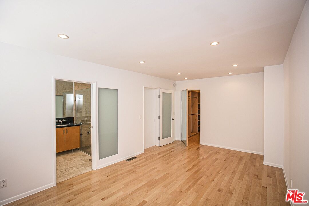 14 Privateer Street, Unit 1 Marina del Rey, CA 90292 - Photo 15 of 32 a view of empty room with wooden floor