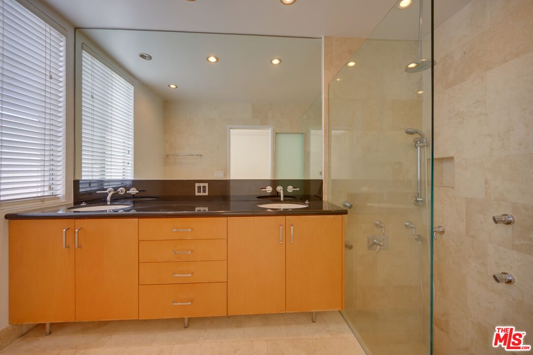 14 Privateer Street, Unit 1 Marina del Rey, CA 90292 - Photo 18 of 32 a bathroom with a sink and a mirror