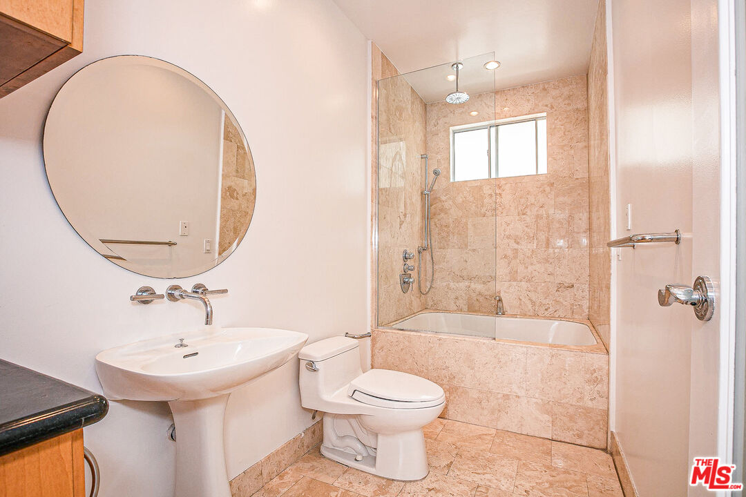 14 Privateer Street, Unit 1 Marina del Rey, CA 90292 - Photo 21 of 32 a bathroom with a sink a toilet and shower