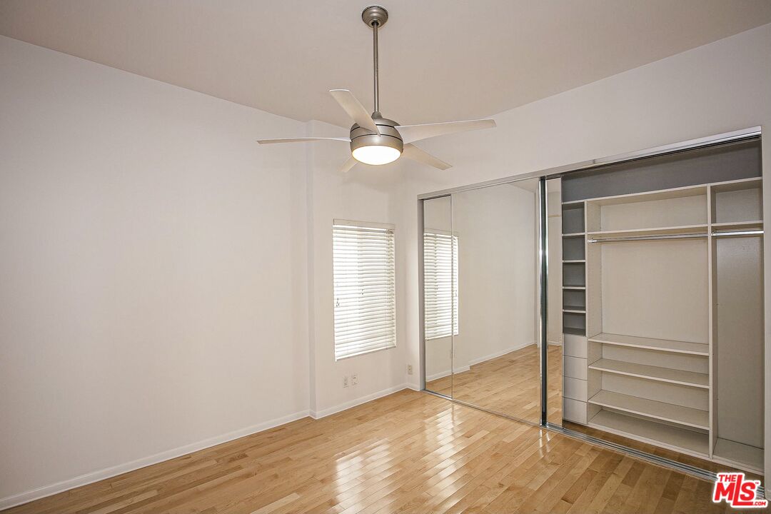 14 Privateer Street, Unit 1 Marina del Rey, CA 90292 - Photo 23 of 32 wooden floor in an empty room with a window