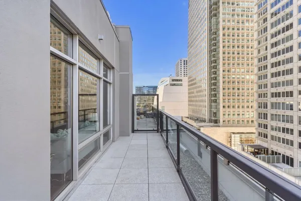 a view of a balcony with a sink