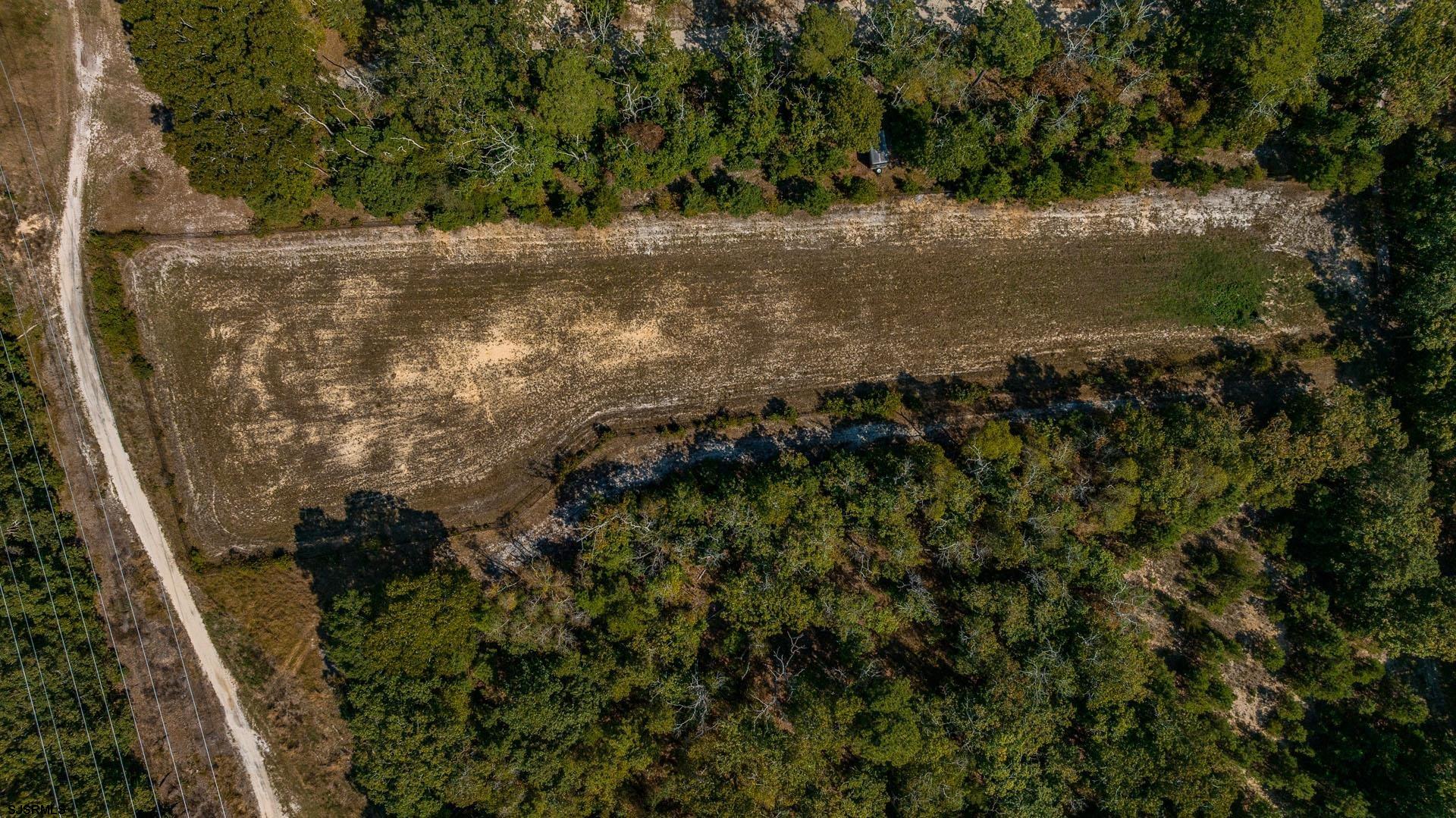 15 Clayton Drive Ocean View, NJ 08230 - Photo 27 of 29 a view of a lake with a park