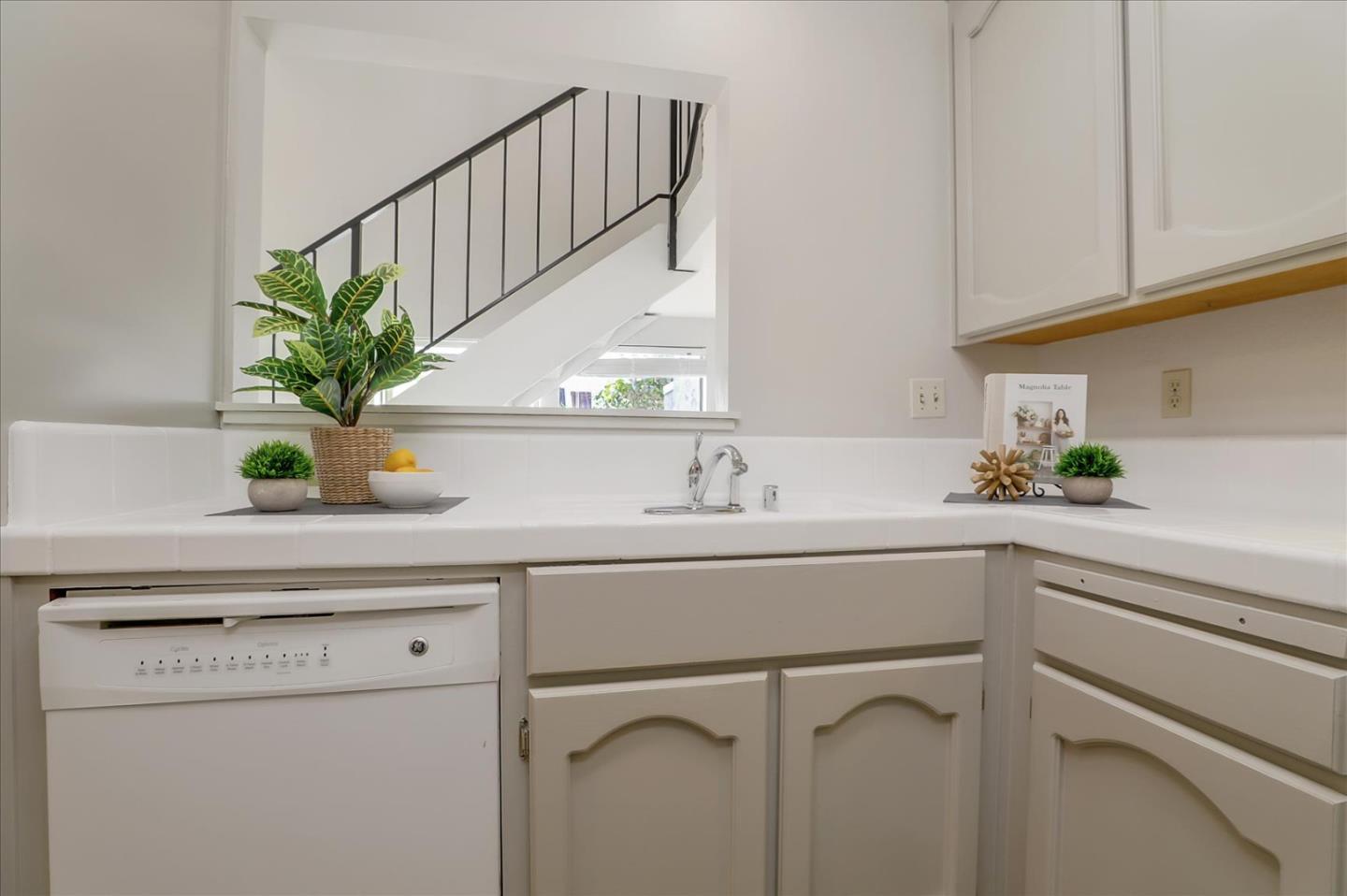 1239 Henderson Avenue, Unit R Sunnyvale, CA 94086 - Photo 18 of 42 a sink with white cabinets