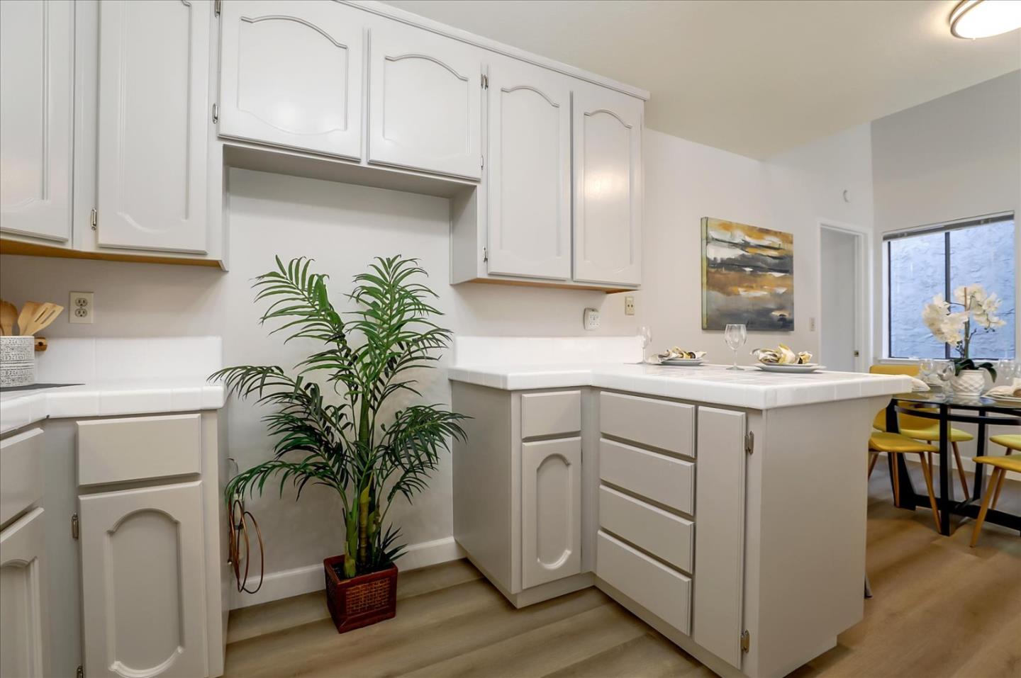 1239 Henderson Avenue, Unit R Sunnyvale, CA 94086 - Photo 20 of 42 a utility room with cabinets washer and dryer
