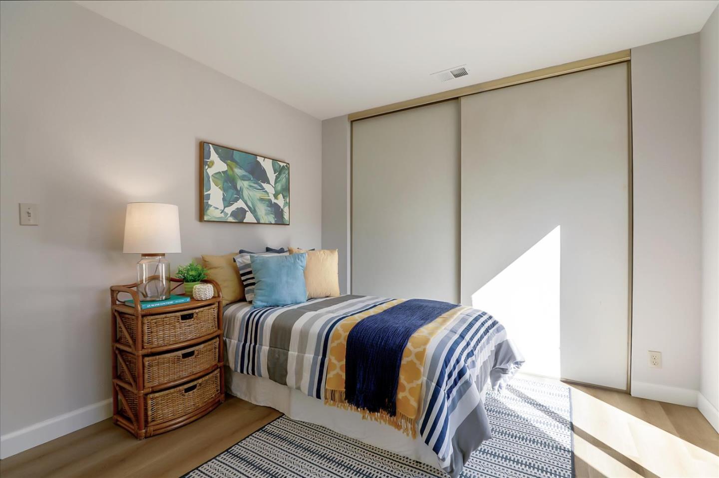 1239 Henderson Avenue, Unit R Sunnyvale, CA 94086 - Photo 37 of 42 a bedroom with a bed and wooden floor