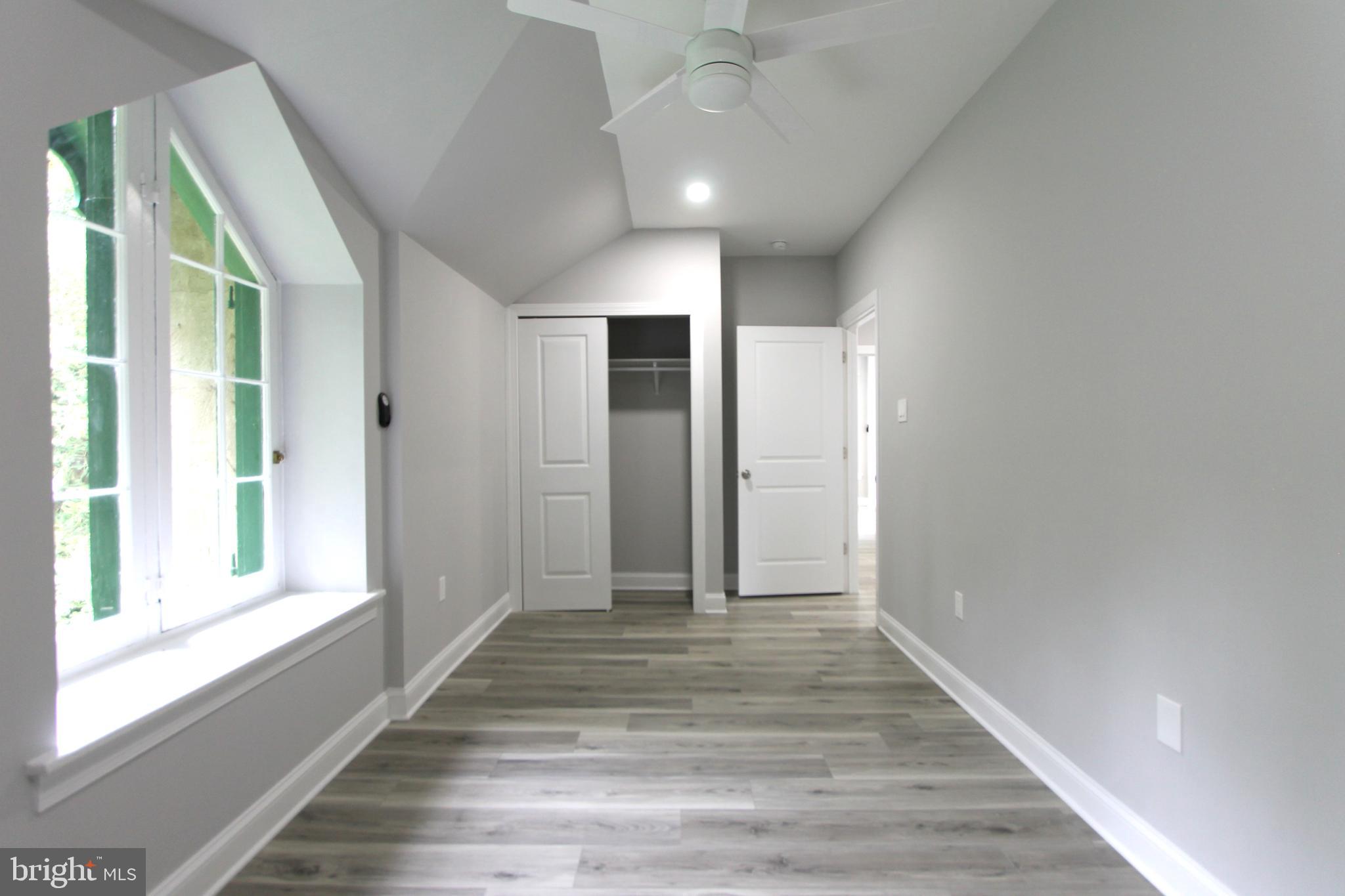 5925-31 Devon Place Philadelphia, PA 19138 - Photo 11 of 27 a view of a room with wooden floor and windows