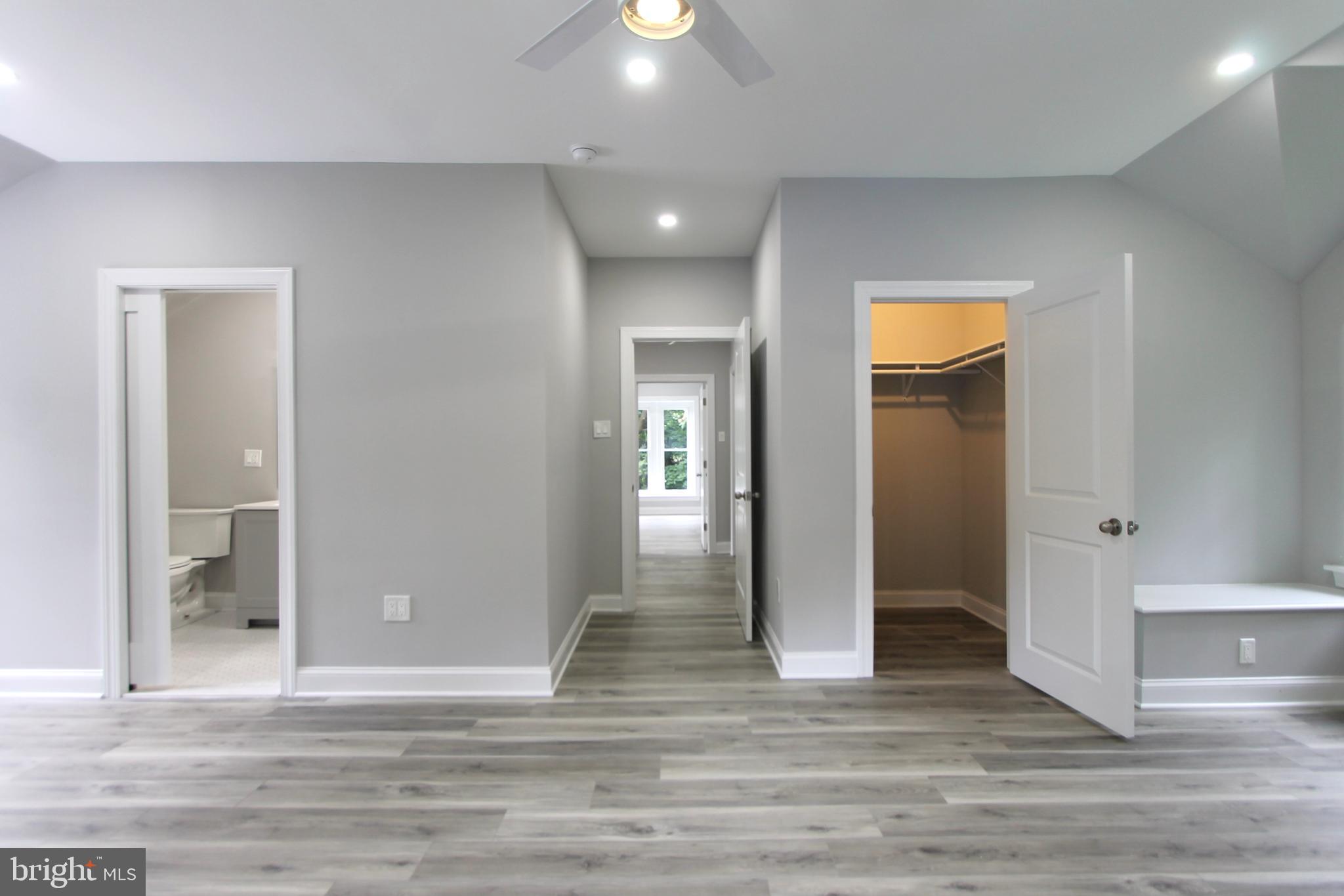 5925-31 Devon Place Philadelphia, PA 19138 - Photo 17 of 27 a view of a hallway with wooden floor and a living room