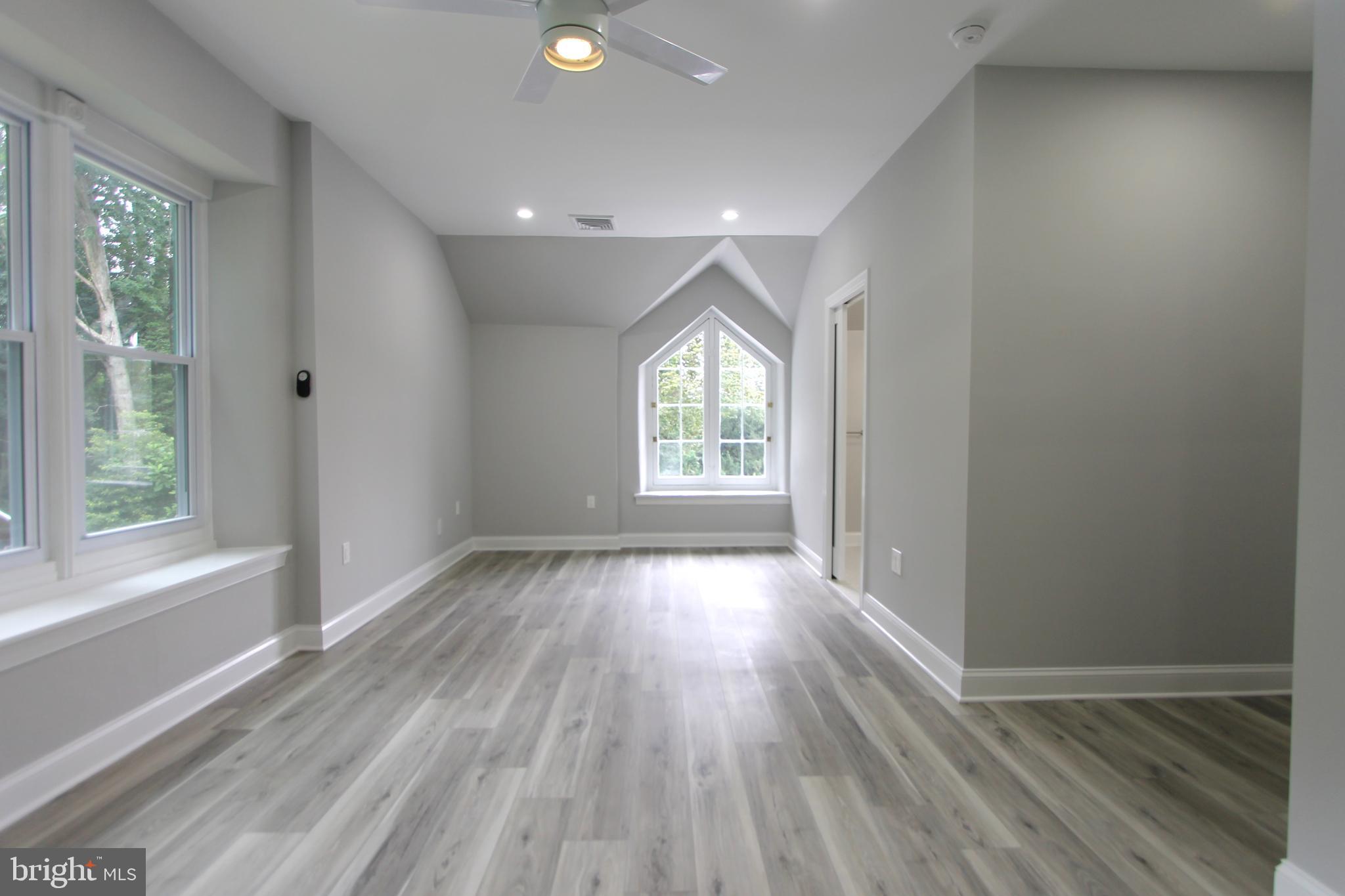 5925-31 Devon Place Philadelphia, PA 19138 - Photo 20 of 27 wooden floor in an empty room with a window