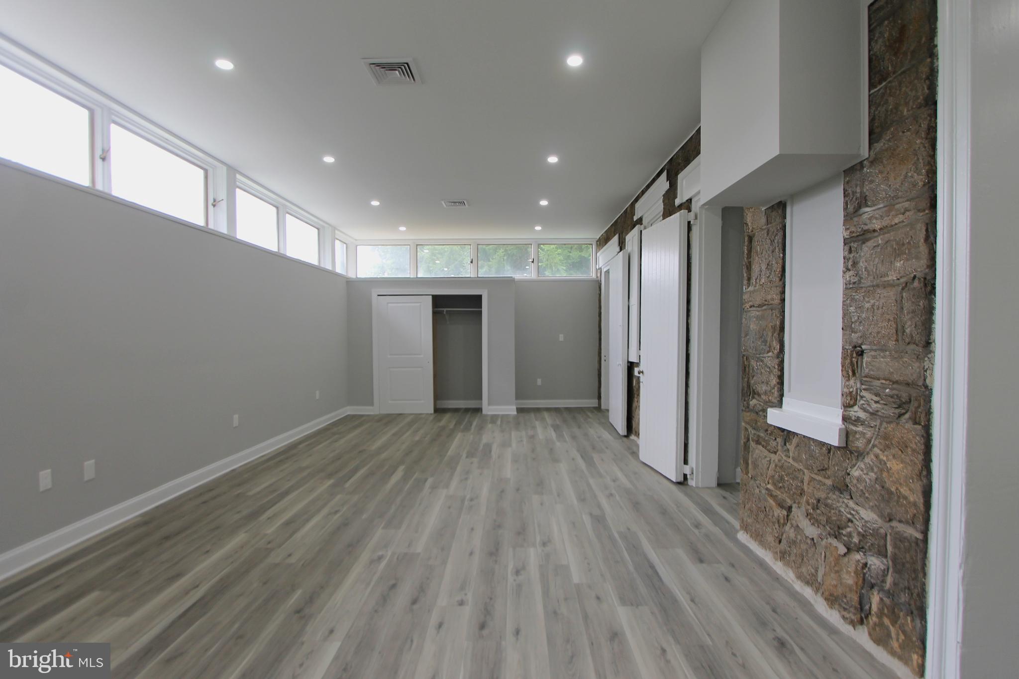 5925-31 Devon Place Philadelphia, PA 19138 - Photo 4 of 27 a view of a hallway with wooden floor