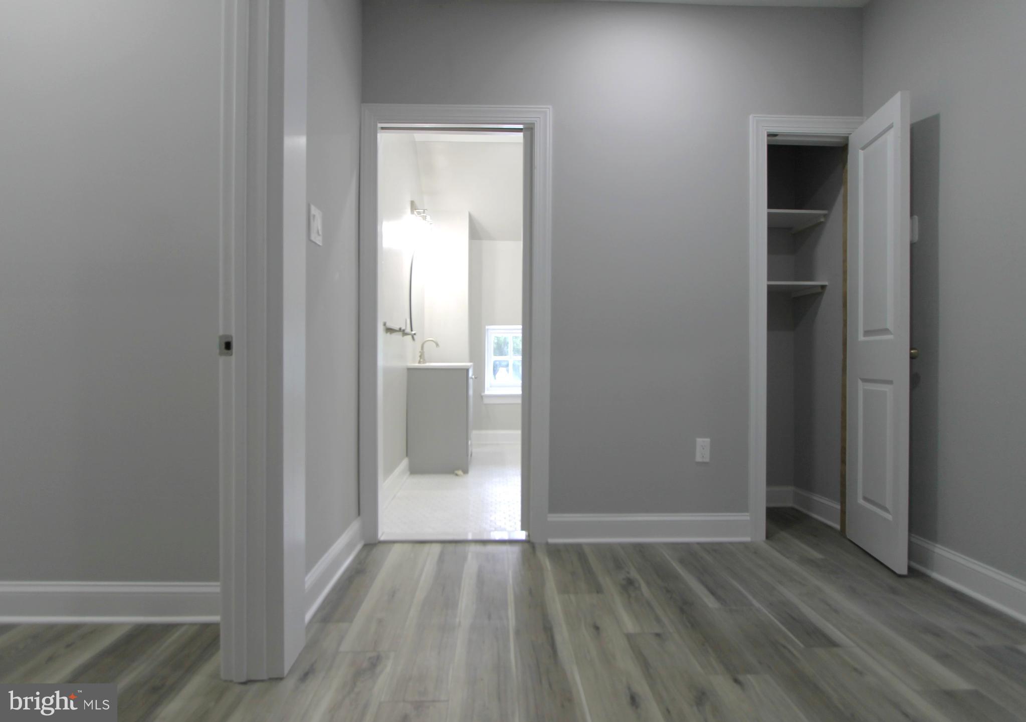 5925-31 Devon Place Philadelphia, PA 19138 - Photo 6 of 27 wooden floor in an empty room