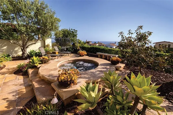 a view of a backyard of the house