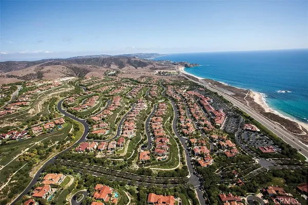 an aerial view of beach and ocean